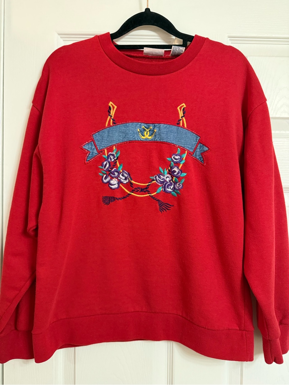Koret Red Crewneck Sweater with Embroidered Floral Crest